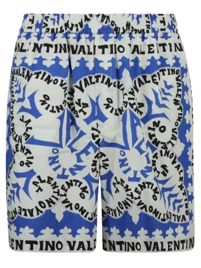 Valentino All-over Logo Print Shorts In Azure