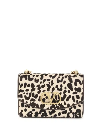 Valentino Garavani Animalier Pony Effect Shoulder Bag In Black