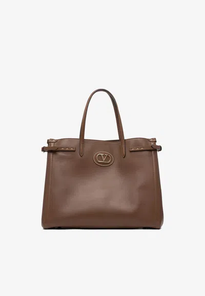 Valentino Garavani Antibes Leather Handbag In Brown