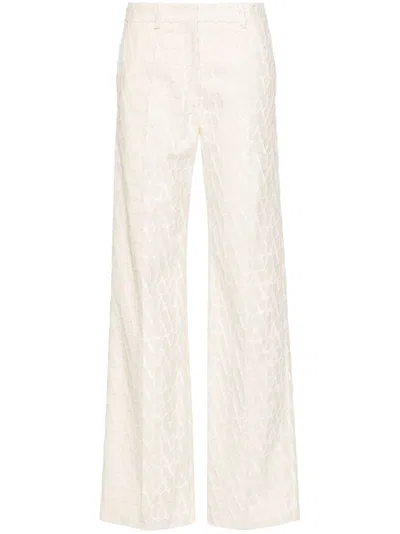 VALENTINO BEIGE TOILE ICONOGRAPHE FLOCKED TAILORED TROUSERS