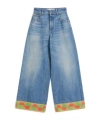 Valentino Garavani Light Blue Jeans With Logo Patch On The Back And Jacquard Cuffs In Denim Woman In Blue