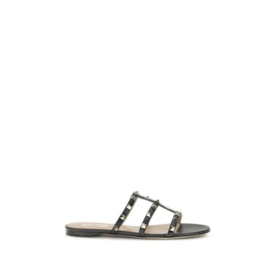 VALENTINO GARAVANI BLACK CALF LEATHER BOS TAURUS FLAT SANDALS