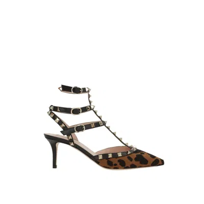 Valentino Garavani Black Calfskin Platform Pumps In Animal Print