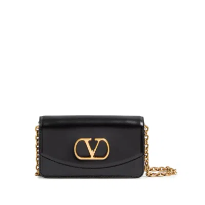 Valentino Garavani Vain Small Vlogo Leather Clutch Bag In Black