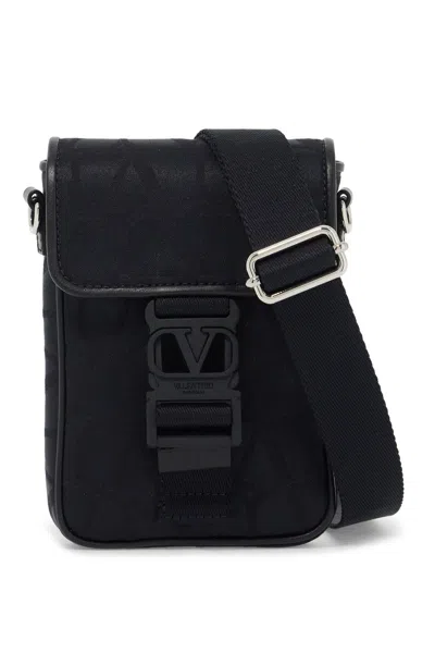 Valentino Garavani Black Iconographe Mini Crossbody Bag In Blue