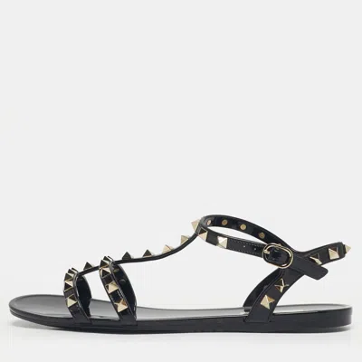 Pre-owned Valentino Garavani Black Jelly Rockstud Ankle Strap Flats Size 39 In Sand