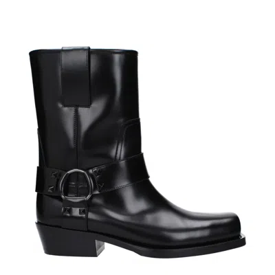 Valentino Garavani Black Leather Ankle Boots In Animal Print