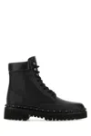 Valentino Rockstud Lug Sole Leather Combat Boot In Black