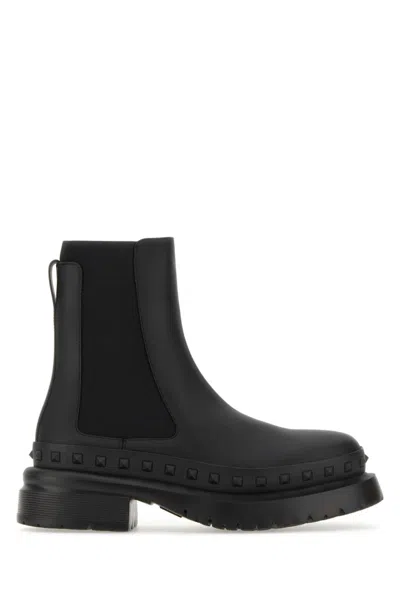 VALENTINO GARAVANI MEN BLACK LEATHER ROCKSTUD BOOTS, 6 LUXURY BOOTS FOR MEN DARVEYS