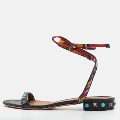 Pre-owned Valentino Garavani Black Leather Rolling Rockstud Ankle Wrap Flat Sandals Size 38.5