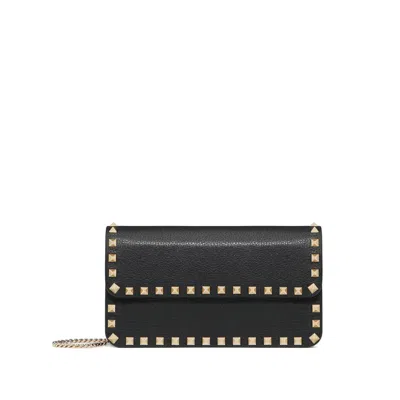 Valentino Garavani Rockstud Textured-leather Clutch In Black