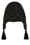 Valentino Wool Blend Beanie With Knit Texture And Tassel Embellishments In Black