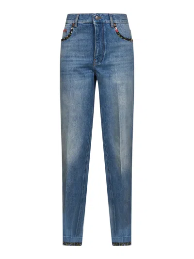 VALENTINO BLUE DENIM JEANS WITH FLORAL PRINT EDGES