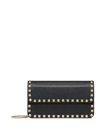 Valentino Garavani Rockstud Leather Clutch Bag In Black