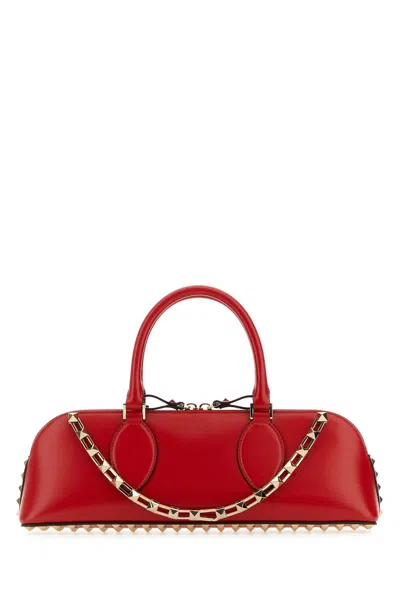 Valentino Garavani Duffle Rockstud Red Calf Leather Handbag In Rouge Pur