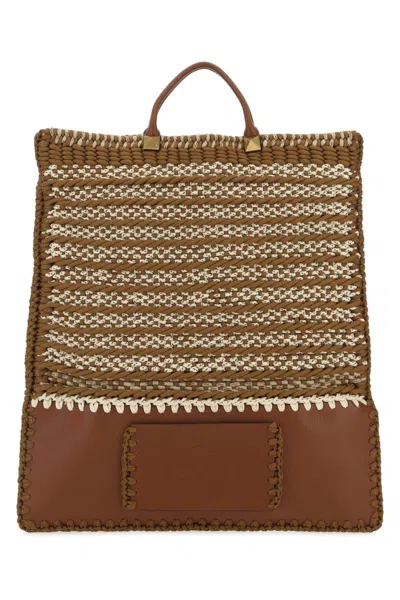 Valentino Garavani Handbags. In Brown