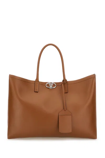 Valentino Garavani Brown Leather Medium Vlogo Locker Shopping Bag In Tabacco