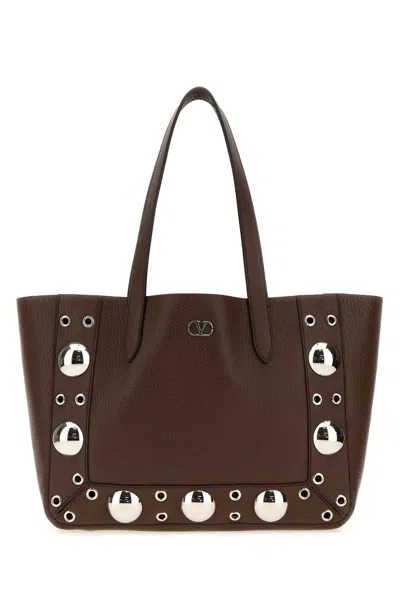 Valentino Garavani Nellcote Embellished Suede Tote In Brown