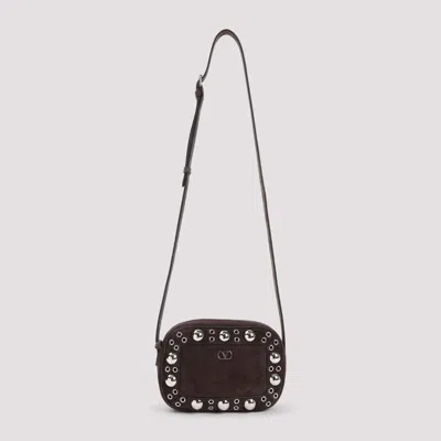 Valentino Garavani Dome-shaped Crossbody Bag With Metallic Eyelets And Adjustable Strap In Brown
