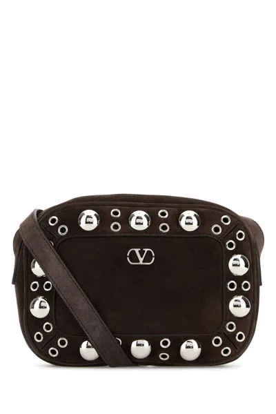 Valentino Garavani Dome-shaped Crossbody Bag With Metallic Eyelets And Adjustable Strap In Brown
