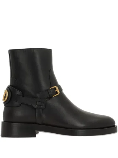 Valentino Garavani Buckle-strap Logo Boots In Black