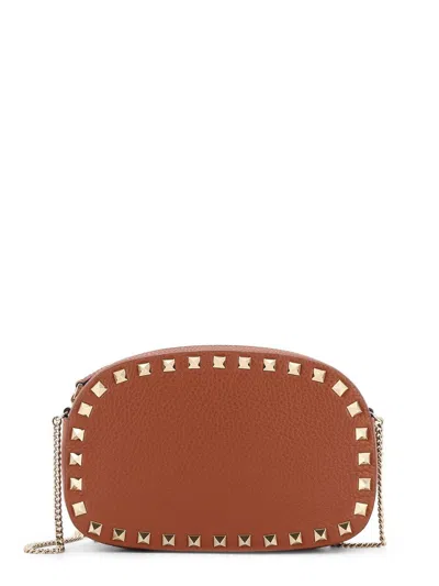 Valentino Garavani Chic Mini Handbag With Rockstud Accents In Brown