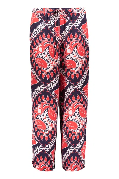 VALENTINO COMFORTABLE PANTS WITH GEOMETRIC PINK AND PURPLE PATTERN