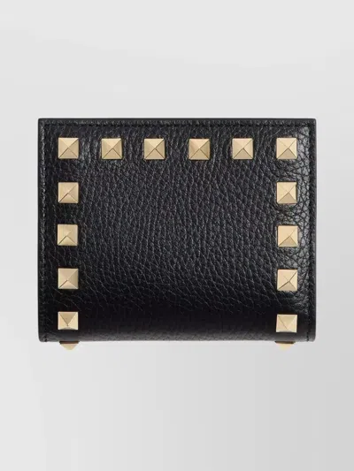 Valentino Garavani Compact Wallet Featuring Studded Texture In Black