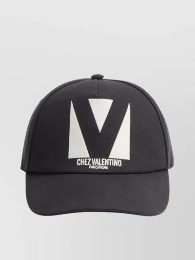 VALENTINO GARAVANI COTTON CAP WITH ADJUSTABLE STRAP AND CURVED PEAK