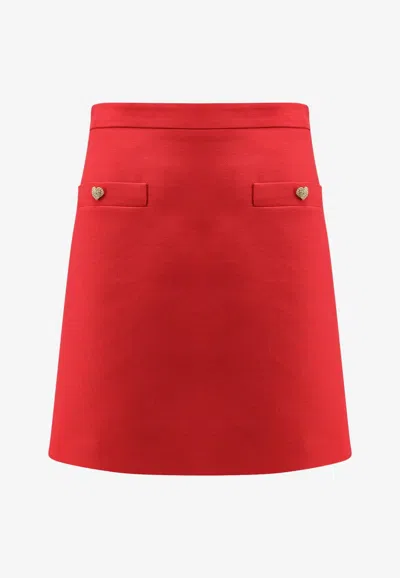VALENTINO COUTURE MINI SKIRT WITH HEART-JEWEL BUTTONS