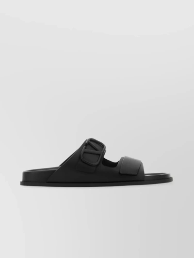 VALENTINO GARAVANI CROSS STRAP FLAT SLIPPERS