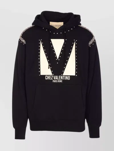 VALENTINO CRYSTAL EMBELLISHED HOODIE WITH EMBROIDERED GRAPHIC