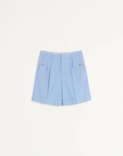 Valentino Cuffed Denim Bermuda Shorts In Blue