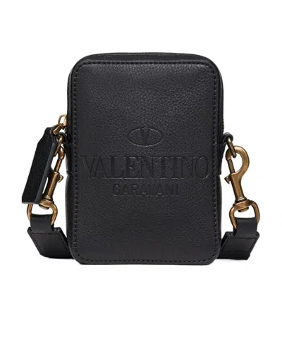 Valentino Garavani Debossed-logo Crossbody Bag In Black