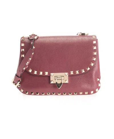 Valentino Garavani Decorated Shoulder Bag With Studs In Red