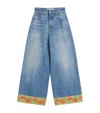 Valentino Garavani Light Blue Jeans With Logo Patch On The Back And Jacquard Cuffs In Denim Woman In Blue