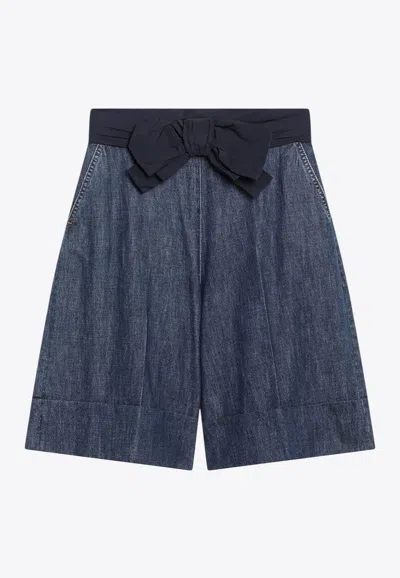 VALENTINO DENIM BERMUDA SHORTS WITH OVERSIZED-BOW