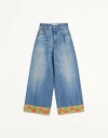 Valentino Garavani Light Blue Jeans With Logo Patch On The Back And Jacquard Cuffs In Denim Woman In Denim