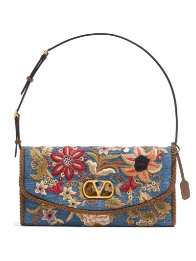 Valentino Garavani Devain Small Embroidered Denim Shoulder Bag In Blue