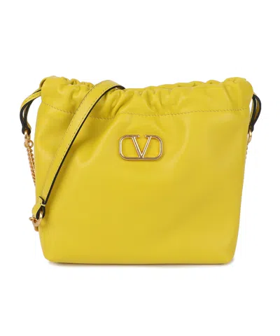 Valentino Garavani Drawstring Shoulder Bag In Yellow