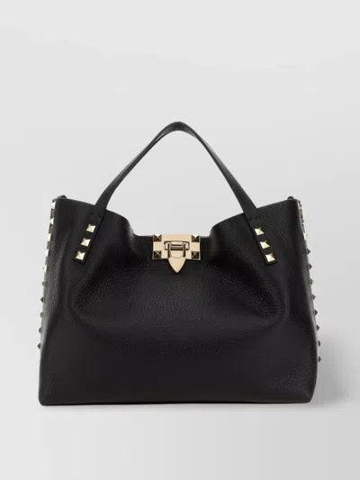 Valentino Garavani Embellished Leather Handbag With Top Handle In Black