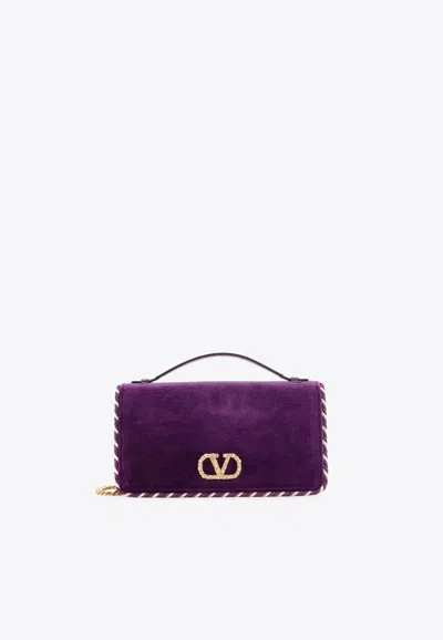Valentino Garavani Encrusted Vlogo Velvet Shoulder Bag In Purple