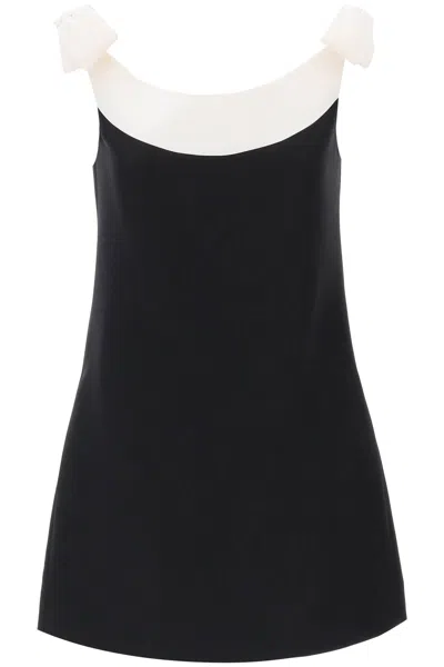 VALENTINO FLARED BLACK MINI DRESS WITH BOWS AND CONTRAST TRIM FOR WOMEN (FW23)