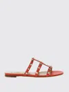 Valentino Rockstud Flat Sole Open Toe Sandals In Orange