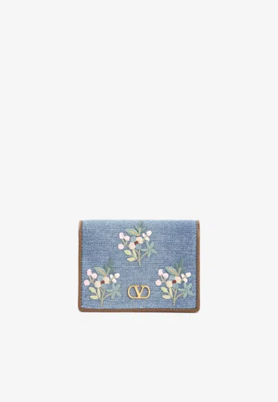 Valentino Garavani Floral Embroidered Vlogo Denim Wallet In Blue