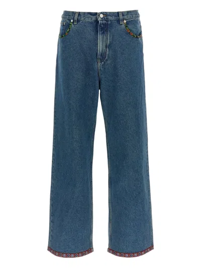 VALENTINO FLORAL-INSERT JEANS