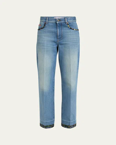 VALENTINO FLORAL-PRINT TRIM STRAIGHT-LEG DENIM JEANS