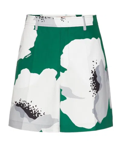VALENTINO FLOWER PORTRAIT-PRINT BERMUDA SHORTS
