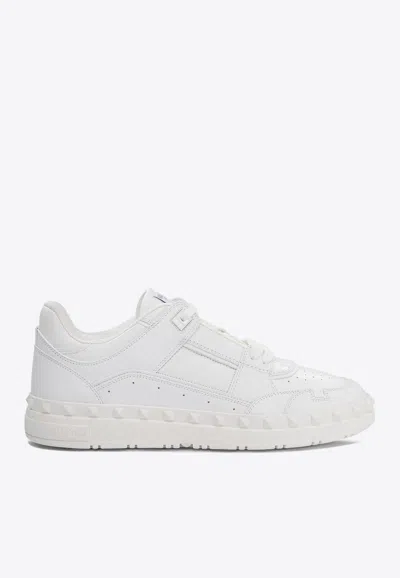 VALENTINO GARAVANI FREEDOTS LEATHER LOW-TOP SNEAKERS