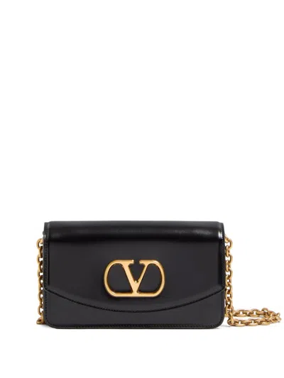 Valentino Garavani Vain Small Vlogo Leather Clutch Bag In Black